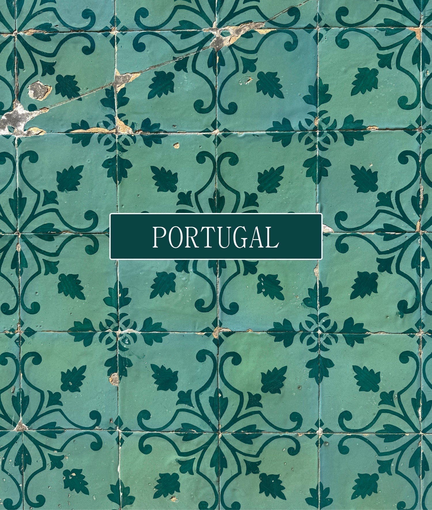 Green Portuguese azulejo tiles framing a Portugal sign